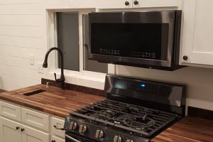 La Ventana Kitchen With Black Stainless Appliances