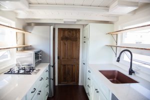 Kitchen and Pocket Door Into Bathroom